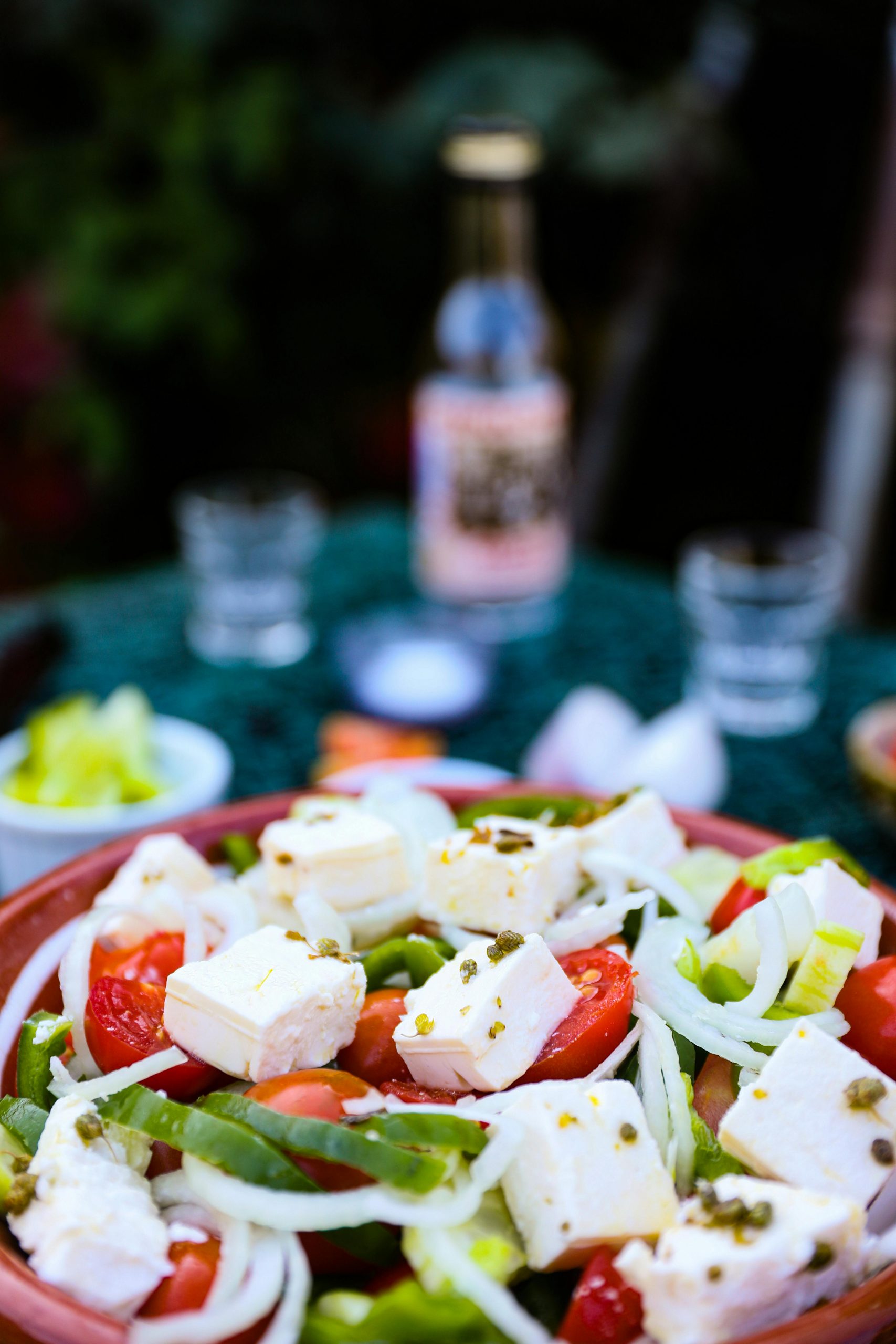 Home Vibrant Greek salad with feta, tomatoes, and onions, perfect for healthy eating.
